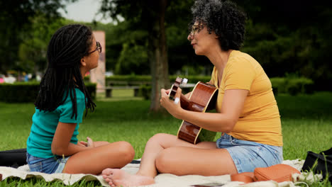 Mother-and-daughter-enjoying-day-at-the-park